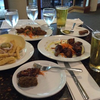 Islands Bar - plates of food and drinks on a table - Canadian (New) Near Me - Harrison Hot Springs, British Columbia Islands Bar - plates of food and drinks on a table - Canadian (New) Near Me - Harrison Hot Springs, British Columbia