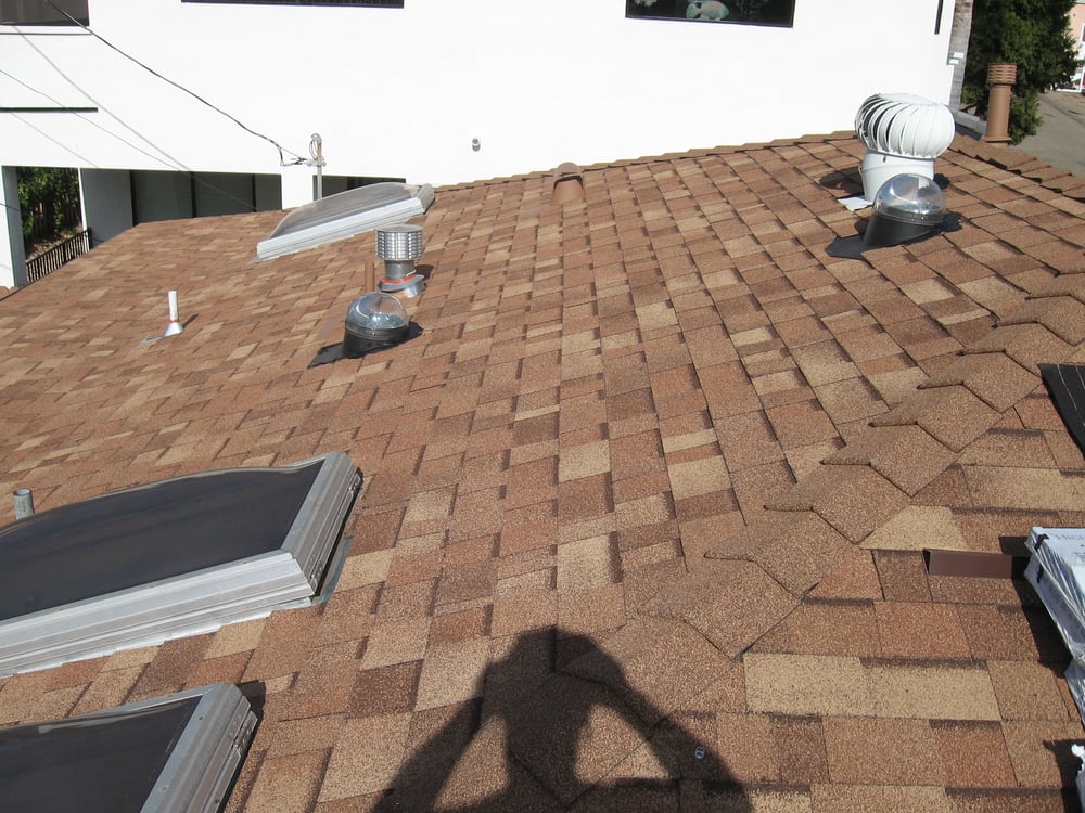 Slide of Coast Roofing