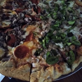 Shield's Restaurant Bar Pizzeria - Round pizza - Pizza Near Me - Troy, Michigan