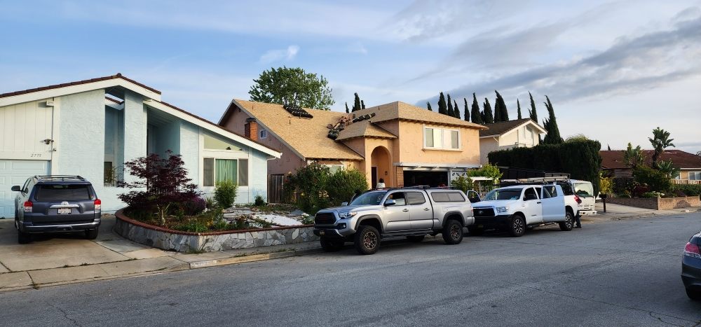 Slide of Julio & Family Roofing