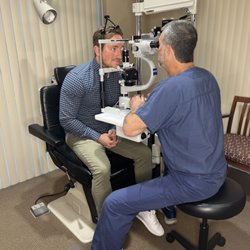 Checking eyes during the consultation with Dr. Blanton.