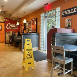 Raising Cane's Chicken Fingers - Inside on a rainy day.