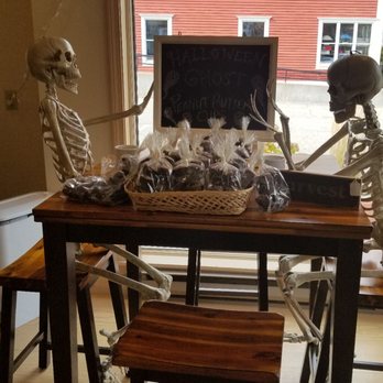 Auntie's House - two skeletons sitting at a table - Bakeries Near Me - Kennebunk, Maine