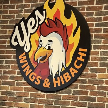 Yes Wings & Hibachi - a sign on a brick wall - Chicken Wings Near Me - Stockbridge, Georgia Yes Wings & Hibachi - a sign on a brick wall - Chicken Wings Near Me - Stockbridge, Georgia
