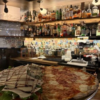 Rubirosa - Half and half LG Vodka Pizza - Italian Near Me - New York, New York Rubirosa - Half and half LG Vodka Pizza - Italian Near Me - New York, New York