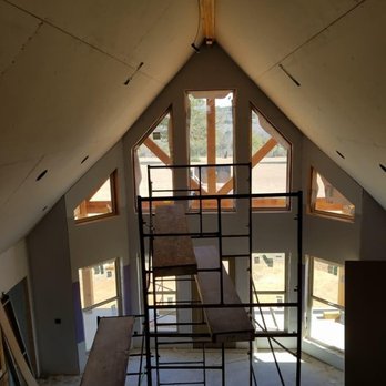 Tatum & Associates - a view of a loft with a ladder - General Contractors Near Me - Marianna, Florida Tatum & Associates - a view of a loft with a ladder - General Contractors Near Me - Marianna, Florida