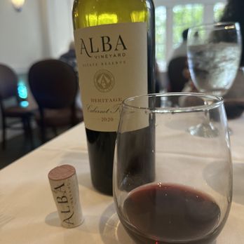 Dora - a glass of wine and a bottle of wine - Italian Near Me - Clinton, New Jersey Dora - a glass of wine and a bottle of wine - Italian Near Me - Clinton, New Jersey