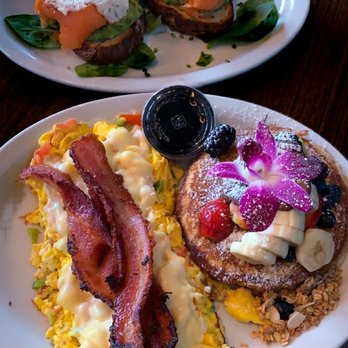 Bistro Cafe - Toasted avocado salmon, pancakes and an cheese omelette with bacon - Breakfast & Brunch Near Me - Miami, Florida Bistro Cafe - Toasted avocado salmon, pancakes and an cheese omelette with bacon - Breakfast & Brunch Near Me - Miami, Florida