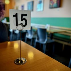 Order at the counter, take a number and find a seat