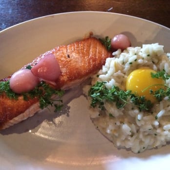 Flying Pig Pub & Kitchen - Salmon with risotto and quail egg and pickled shallot. The egg kicks up the risotto to a decadent level. - Pubs Near Me - Oceanside, California Flying Pig Pub & Kitchen - Salmon with risotto and quail egg and pickled shallot. The egg kicks up the risotto to a decadent level. - Pubs Near Me - Oceanside, California