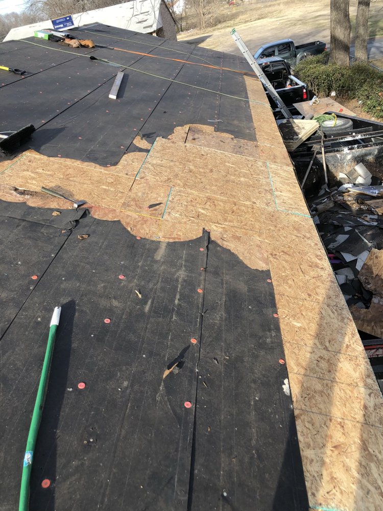 Slide of Erik's Roofing