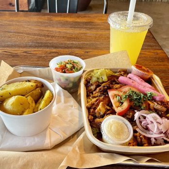 Mazra - The charcoal BBQ chicken with Arabic salad and potatoes. With the pineapple drink. - Middle Eastern Near Me - San Bruno, California