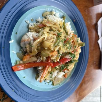 Tarpon's Table - Fresh local catch, wahoo with coconut, curry sauce, sweet peppers, and white rice - New American Near Me - Red Hook, Virgin Islands