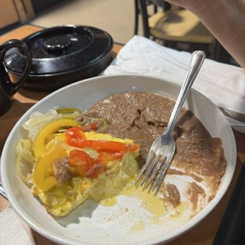 Fresco-Eats - Half of his omelet. He couldn't wait. Lol. - Mexican Near Me - Rockport, Texas Fresco-Eats - Half of his omelet. He couldn't wait. Lol. - Mexican Near Me - Rockport, Texas