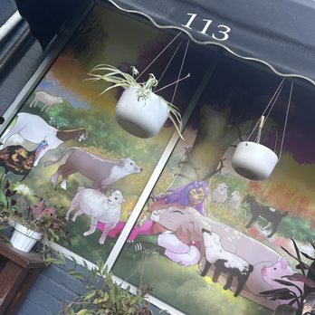 Chicana - Cute art on the back patio - Vegan Near Me - Fullerton, California Chicana - Cute art on the back patio - Vegan Near Me - Fullerton, California