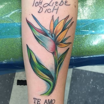 Rick Walters' World Famous Tattoo Parlor - Bird of paradise with I love you in German & Spanish by Tim - Tattoo Near Me - Sunset Beach, California Rick Walters' World Famous Tattoo Parlor - Bird of paradise with I love you in German & Spanish by Tim - Tattoo Near Me - Sunset Beach, California