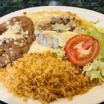 Mi Rodeo - a plate of mexican food and rice - Mexican Near Me - Louisville, Mississippi Mi Rodeo - a plate of mexican food and rice - Mexican Near Me - Louisville, Mississippi
