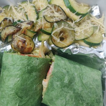 Jessica's Bistro - The sriracha shrimp wrap on spinach with a side of zucchini - New American Near Me - Lake City, Florida