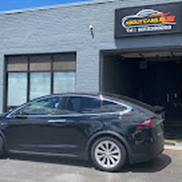 Exterior outside entrance of AboutCars - Matte Paint Protection film application - Model X - Derwood, Maryland Exterior outside entrance of AboutCars - Matte Paint Protection film application - Model X - Derwood, Maryland
