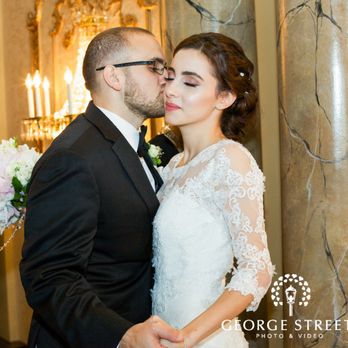 Martin's Caterers - Wedding couple sharing a moment- photo by George Street - Caterers Near Me - Baltimore, Maryland
