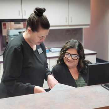 Vintage Dental - Here is Dannelle & Maria going over the schedule for tomorrow! - General Dentistry Near Me - Modesto, California Vintage Dental - Here is Dannelle & Maria going over the schedule for tomorrow! - General Dentistry Near Me - Modesto, California