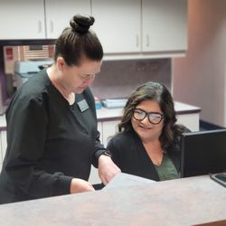Vintage Dental - Here is Dannelle & Maria going over the schedule for tomorrow!