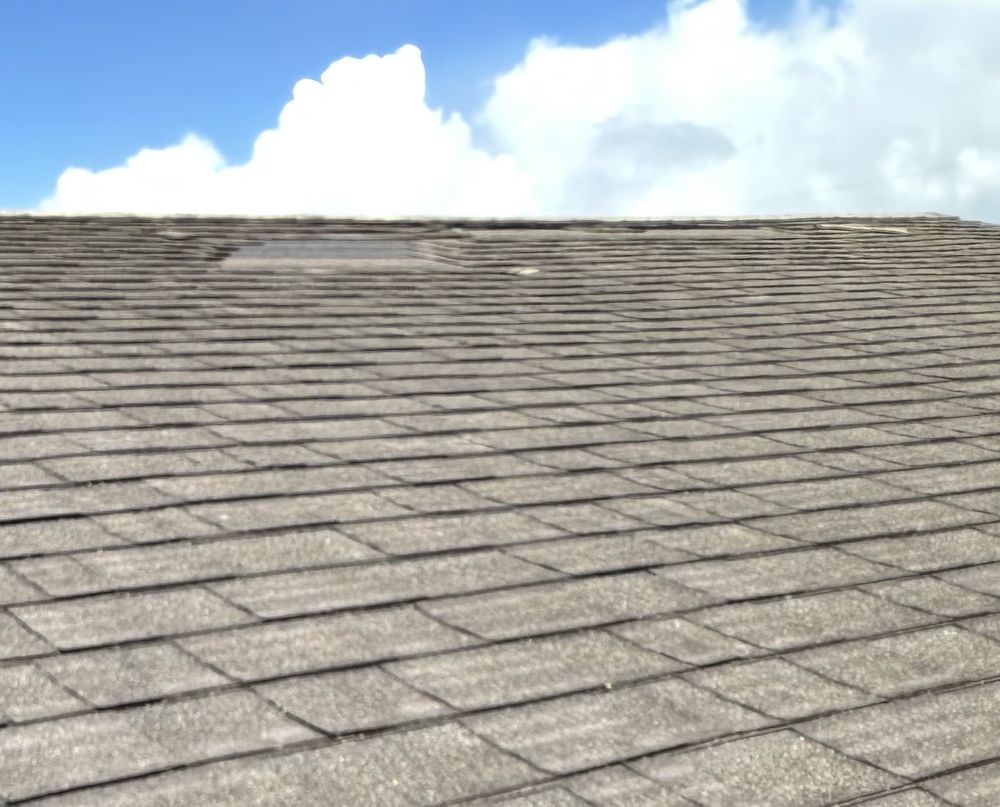 Slide of J&E ROOFING