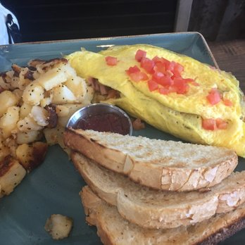 First Watch - Veggie omelette with potatoes and sour dough toast - Breakfast & Brunch Near Me - San Antonio, Texas