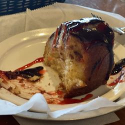 Rosie's Cafe - Crack cake drizzled with raspberry and chocolate