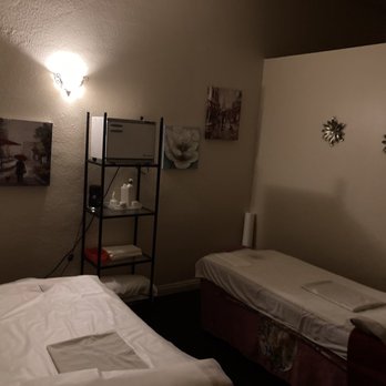Wi Massage - Our couples massage room. Typical room for these types of massage spots. Nothing to grand. But the massage was perfect. - Massage Near Me - Whittier, California