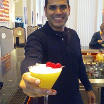 Living Room Bar - Oscar whippin up a lemongrass drop - Bars Near Me - Washington, DC, District of Columbia