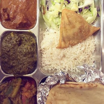 Bombay Mahal Express - Thali with (clockwise from top right) salad, samosa, rice, naan, braised eggplant/veggies, saag paneer, lamb. - Indian Near Me - Montreal, Quebec Bombay Mahal Express - Thali with (clockwise from top right) salad, samosa, rice, naan, braised eggplant/veggies, saag paneer, lamb. - Indian Near Me - Montreal, Quebec