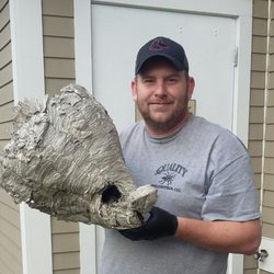 Quality Pest Control Since 1995 - Kevin Gaynor of Quality Pest Control Co. with a Bald Face Hornets Nest.