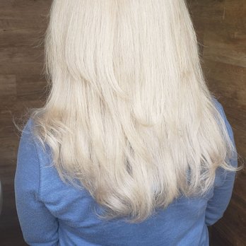 The Beehive Boutique Salon - Normally I have very curly hair. Savannah wanted to blow it out to really see the new color. - Hair Salons Near Me - Chicago, Illinois