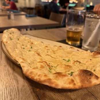Saffron Kitchen and Bar - Garlic cilantro Naan - Indian Near Me - Arlington, Texas Saffron Kitchen and Bar - Garlic cilantro Naan - Indian Near Me - Arlington, Texas