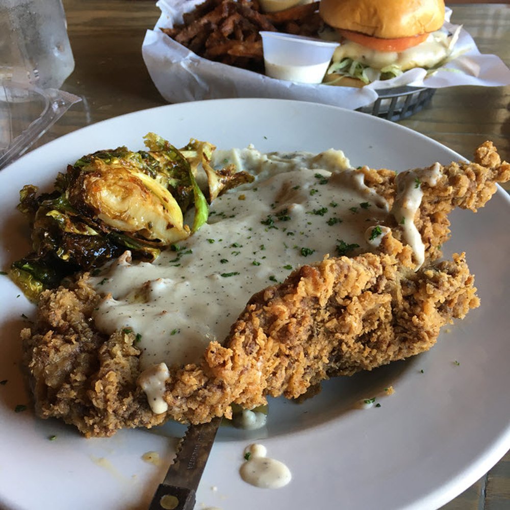 Your Mom's - delicious chicken fried steak, brussels sprouts, and mashed potatoes...OH MY! grilled chicken sandwich and fries in the back...mmmmmm - American Near Me - Smithville, Texas Your Mom's - delicious chicken fried steak, brussels sprouts, and mashed potatoes...OH MY! grilled chicken sandwich and fries in the back...mmmmmm - American Near Me - Smithville, Texas