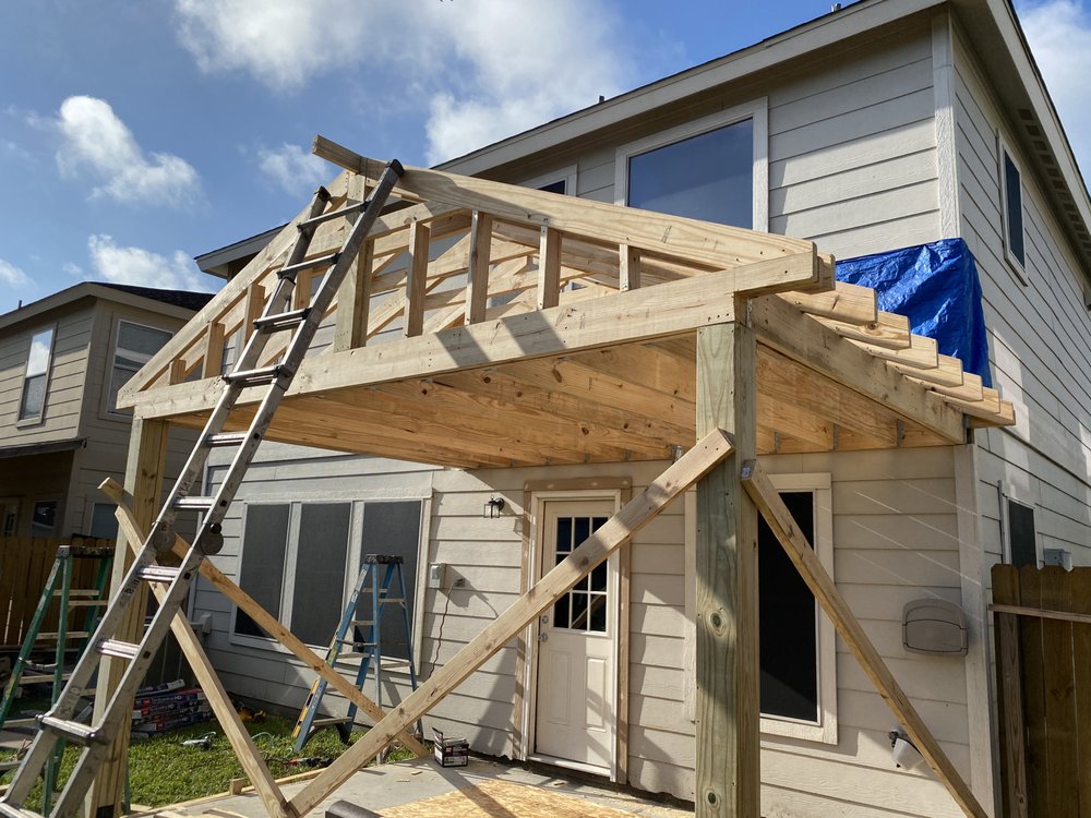 Slide of R.E. Titans Roofing & Restoration