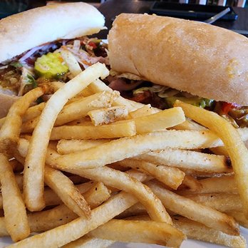Kingfish Kitchen & Cocktails - Cochon De Lait Poboy - Cajun/Creole Near Me - New Orleans, Louisiana Kingfish Kitchen & Cocktails - Cochon De Lait Poboy - Cajun/Creole Near Me - New Orleans, Louisiana
