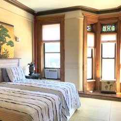 Northern Lights Mansion - Two Twin Beds in Asian decor on Tatami Mats and beautiful nature inspired wall papers & Japanese screen.
