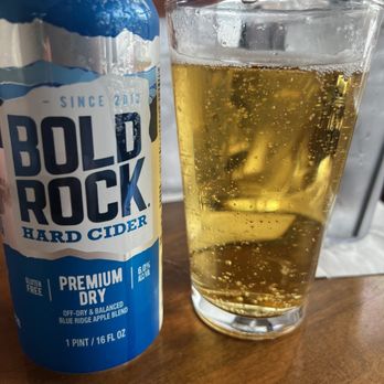 Village Wayside - Bold Rock cider can and filled glass. - Bars Near Me - Asheville, North Carolina Village Wayside - Bold Rock cider can and filled glass. - Bars Near Me - Asheville, North Carolina