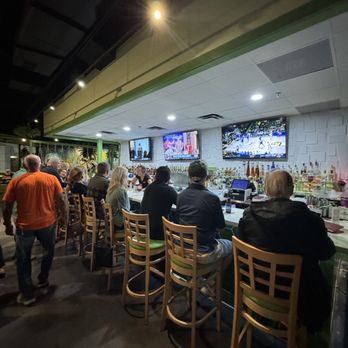 Twisted Lime - a group of people sitting at a bar - Bars Near Me - Vero Beach, Florida Twisted Lime - a group of people sitting at a bar - Bars Near Me - Vero Beach, Florida