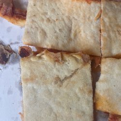 Rocky's Pizza & Restaurant - Undercooked dough