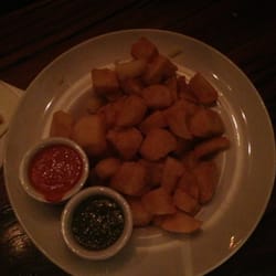 Neighbourhood Brewbar - Deep fried potato with smokey capsicum sauce and pesto