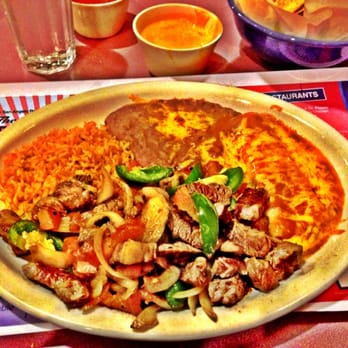 Fuentes Cafe Downtown - Steak a la Méxicana, an enchilada, beans and rice with a side of chile con queso. - Tex-Mex Near Me - San Angelo, Texas Fuentes Cafe Downtown - Steak a la Méxicana, an enchilada, beans and rice with a side of chile con queso. - Tex-Mex Near Me - San Angelo, Texas