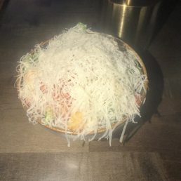 That actually is a Cesar salad. Tons of cheese, and the flavor... out of this world. That actually is a Cesar salad. Tons of cheese, and the flavor... out of this world.