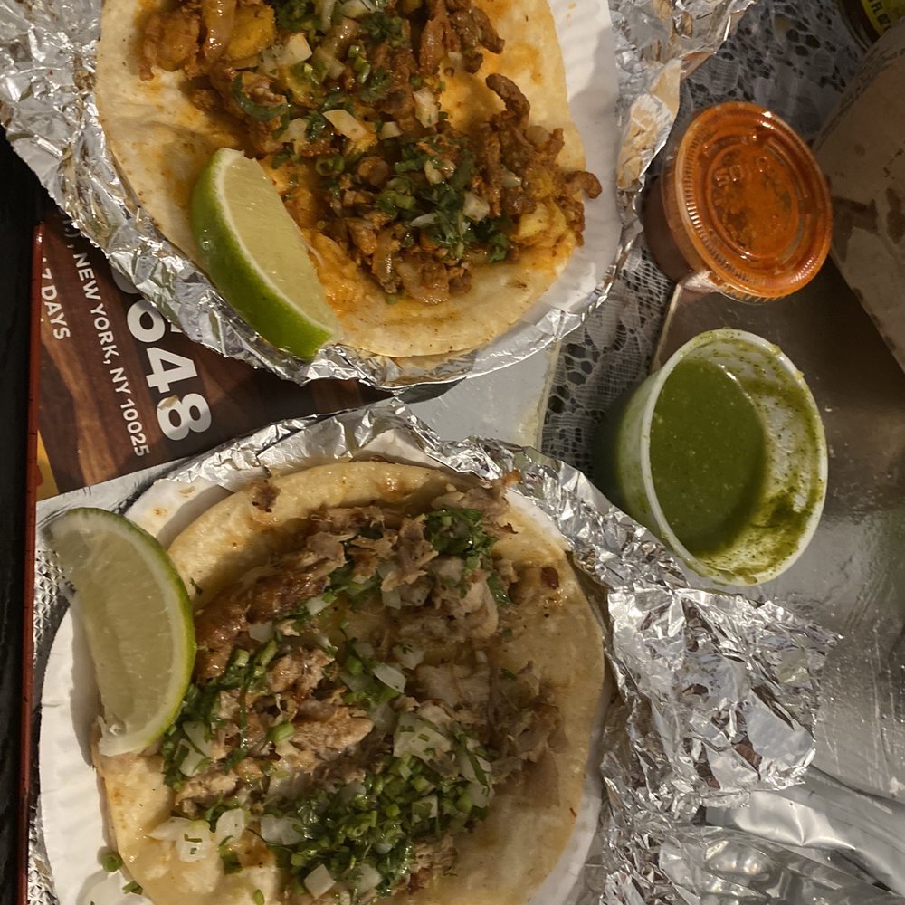 Carnitas and Al pastor Tacos. Carnitas and Al pastor Tacos.