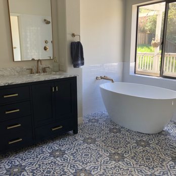 ZAMORA Home Improvement - a bathtub in a bathroom - General Contractors Near Me ZAMORA Home Improvement - a bathtub in a bathroom - General Contractors Near Me