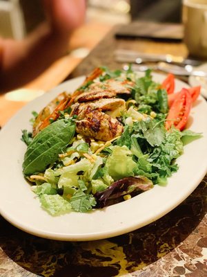 Photo of Grand Lux Cafe - Las Vegas, NV, US. Southwestern Salad - chicken breast, fresh corn, black beans, tortilla strips, avo, pepper-jack cheese