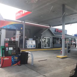 The side where the pumps are and the pizza area.