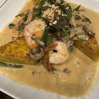 TWO60 Kitchen + Bar - Thai Coconut Curry Prawns, served on a crispy egg noodle cake. - New American Near Me - Fairfield, California TWO60 Kitchen + Bar - Thai Coconut Curry Prawns, served on a crispy egg noodle cake. - New American Near Me - Fairfield, California